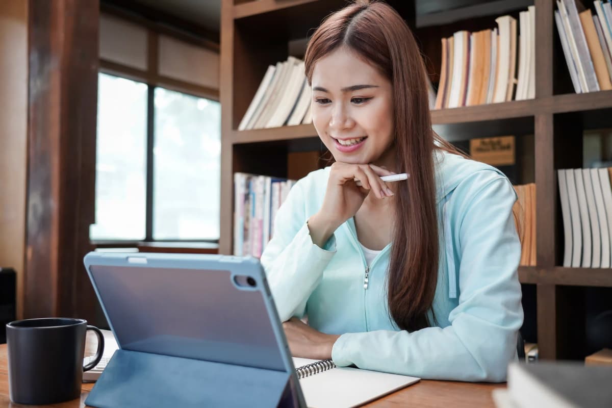 Healthcare professional studying online nursing certification course materials